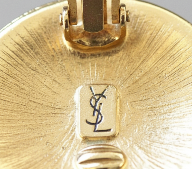 Orecchini vintage Saint Laurent moneta