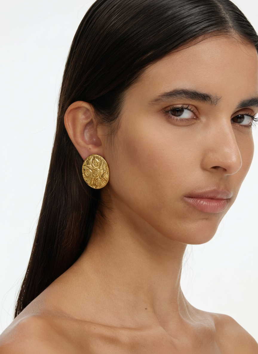 Orecchini vintage Saint Laurent moneta